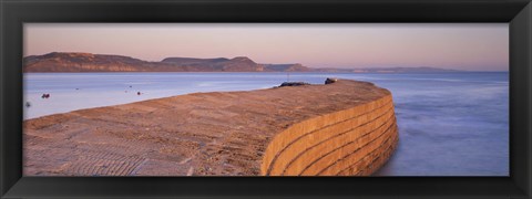 Framed Harbour wall at dusk, The Cobb, Lyme Regis, Dorset, England Print