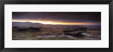 Framed Bright horizon with dark clouds from Higher Tor, Dartmoor, Devon, England Print