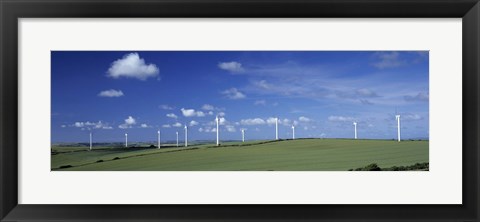 Framed Wind turbines in a farm, Newlyn Downs, Cornwall, England Print