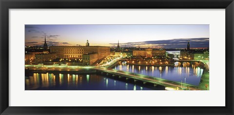 Framed Royal Palace and Parliament building lit up at dusk, Stockholm, Sweden Print