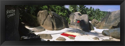 Framed Nudist corner written on a rock on the beach, Mahe Island, Seychelles Print