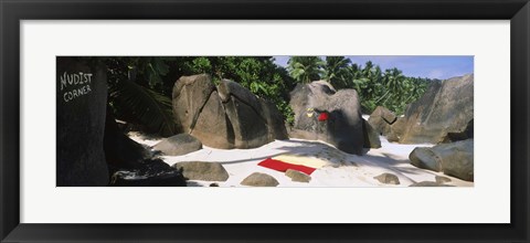 Framed Nudist corner written on a rock on the beach, Mahe Island, Seychelles Print