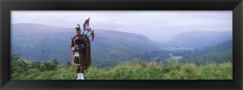 Framed Bagpiper at Loch Broom in Scottish highlands, Ross and Cromarty, Scotland Print