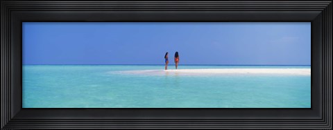 Framed Two women standing on the beach sandbar, Maayafushi Island, Ari Atoll, Maldives Print