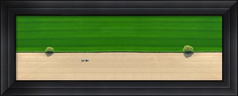 Framed Aerial view of a tractor in field Print