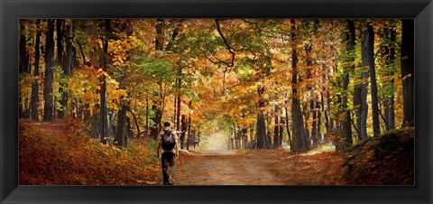 Framed Kid with backpack walking in fall colors Print