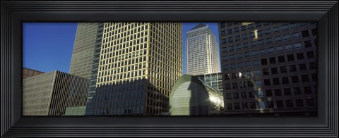 Framed Low angle view of towers, Canary Wharf Tower, South Quay, Isle of Dogs, London, England Print