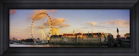 Framed Ferris wheel with buildings at waterfront, Millennium Wheel, London County Hall, Thames River, South Bank, London, England Print