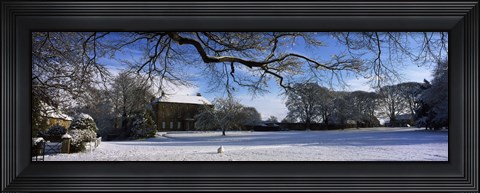 Framed Snow covered village, Crakehall, North Yorkshire, England Print