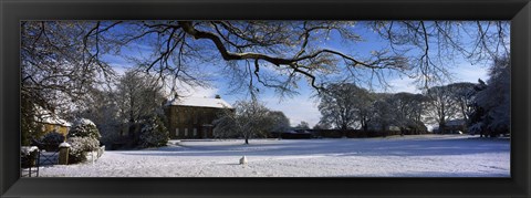 Framed Snow covered village, Crakehall, North Yorkshire, England Print