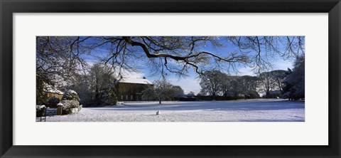 Framed Snow covered village, Crakehall, North Yorkshire, England Print