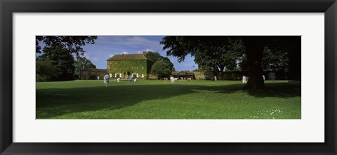 Framed Cricket match on the green at Crakehall, Bedale, North Yorkshire, England Print