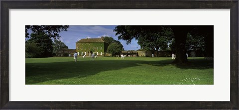 Framed Cricket match on the green at Crakehall, Bedale, North Yorkshire, England Print