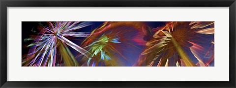 Framed Ferris wheel spinning at night Print
