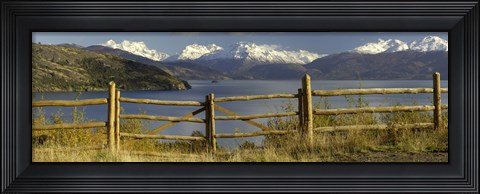 Framed Fence in front of a lake with mountains in the background, Lake General Carrera, Andes, Patagonia, Chile Print