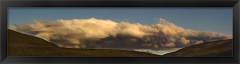 Framed Clouds over a hill Print