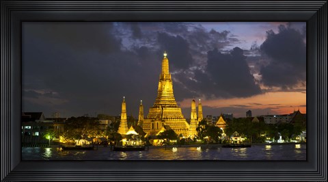 Framed Buddhist temple lit up at dawn, Wat Arun, Chao Phraya River, Bangkok, Thailand Print