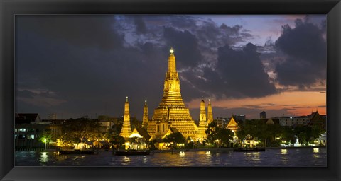 Framed Buddhist temple lit up at dawn, Wat Arun, Chao Phraya River, Bangkok, Thailand Print