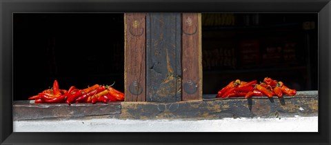 Framed Red chilies drying on window sill, Paro, Bhutan Print