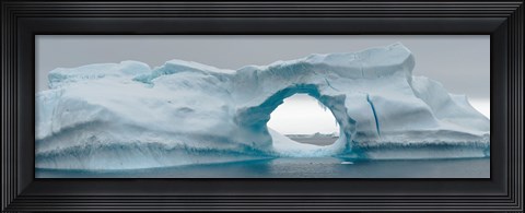 Framed Blue iceberg with hole, Antarctica Print