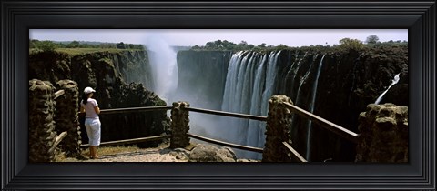Framed Woman looking at the Victoria Falls from a viewing point, Zambia Print