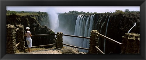 Framed Woman looking at the Victoria Falls from a viewing point, Zambia Print