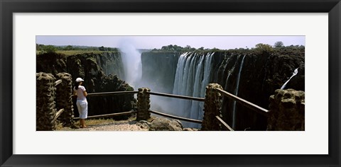 Framed Woman looking at the Victoria Falls from a viewing point, Zambia Print