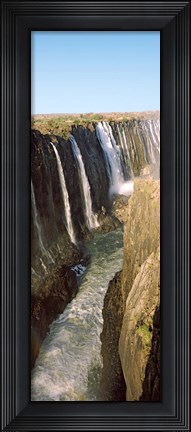 Framed Water falling through rocks in a river, Victoria Falls, Zimbabwe Print