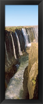 Framed Water falling through rocks in a river, Victoria Falls, Zimbabwe Print