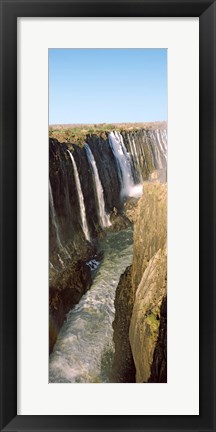 Framed Water falling through rocks in a river, Victoria Falls, Zimbabwe Print