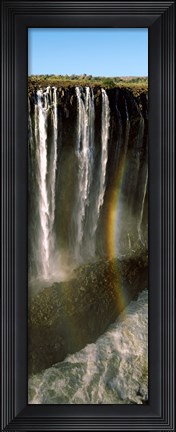 Framed Rainbow forms in the water spray in the gorge at Victoria Falls, Zimbabwe Print