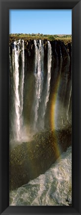 Framed Rainbow forms in the water spray in the gorge at Victoria Falls, Zimbabwe Print
