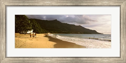 Framed People walking along the Beau Vallon beach, Mahe Island, Seychelles Print
