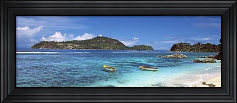 Framed Small fishing boats on Anse L&#39;Islette with Therese Island in background, Seychelles Print
