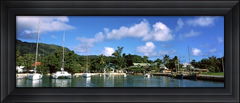 Framed Yachts and small fishing boats at the harbor on La Digue Island, Seychelles Print