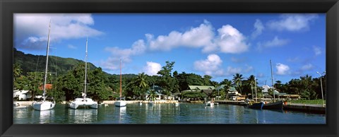 Framed Yachts and small fishing boats at the harbor on La Digue Island, Seychelles Print