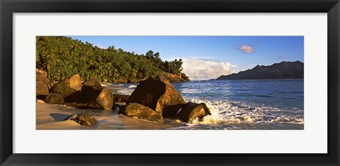 Framed Waves splashing onto rocks on North Island with Silhouette Island in the background, Seychelles Print