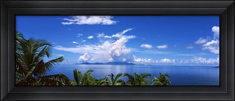 Framed Indian ocean with palm trees towards Mahe Island looking from North Island, Seychelles Print