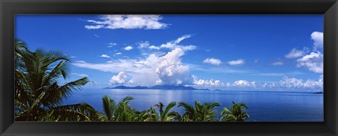 Framed Indian ocean with palm trees towards Mahe Island looking from North Island, Seychelles Print