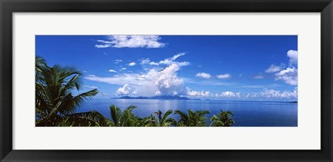 Framed Indian ocean with palm trees towards Mahe Island looking from North Island, Seychelles Print