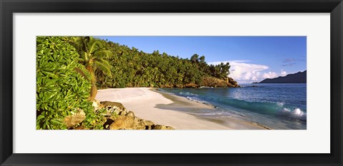 Framed Waves breaking on a small secluded beach on North Island, Seychelles Print