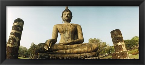 Framed Low angle view of a statue of Buddha, Sukhothai Historical Park, Sukhothai, Thailand Print