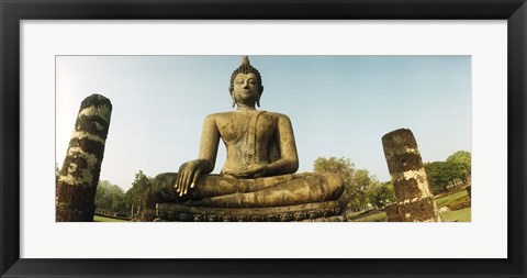 Framed Low angle view of a statue of Buddha, Sukhothai Historical Park, Sukhothai, Thailand Print