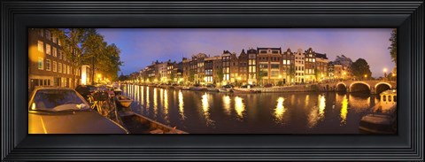 Framed Night view along canal, Amsterdam, Netherlands Print