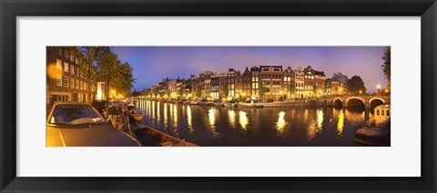 Framed Night view along canal, Amsterdam, Netherlands Print