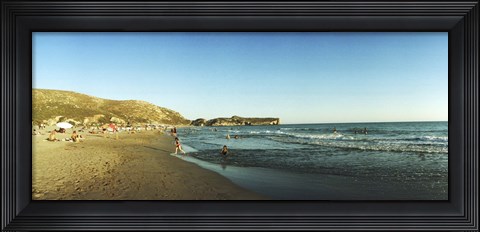 Framed Tourists swimming in the Mediterranean at Patara beach, Patara, Antalya Province, Turkey Print