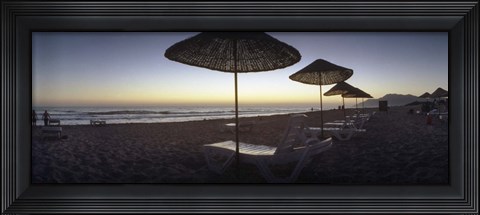 Framed Beach chairs and straw sun umbrellas on Patara Beach on the Mediterranean Sea at sunset, Patara, Antalya Province, Turkey Print