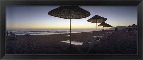 Framed Beach chairs and straw sun umbrellas on Patara Beach on the Mediterranean Sea at sunset, Patara, Antalya Province, Turkey Print