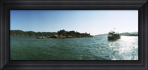 Framed Rocky island and boat in the Mediterranean sea, Sunken City, Kekova, Antalya Province, Turkey Print