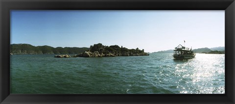 Framed Rocky island and boat in the Mediterranean sea, Sunken City, Kekova, Antalya Province, Turkey Print